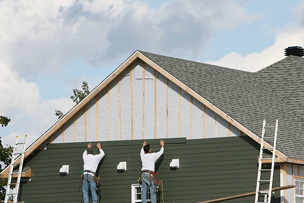 Professional Vinyl Siding technician working in Roxbury Crossing, MA